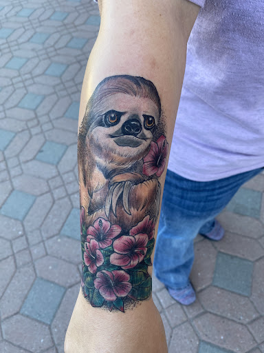 Explore sunflower arm tattoo ideas, creative tattoo ideas in Twin Falls, available at WarmArt Tattoo & BodyPiercing,LLC