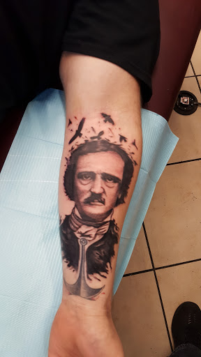 Explore small chest tattoo ideas for guys, creative tattoo ideas in Ocala, available at Lone Wolf Tattoo