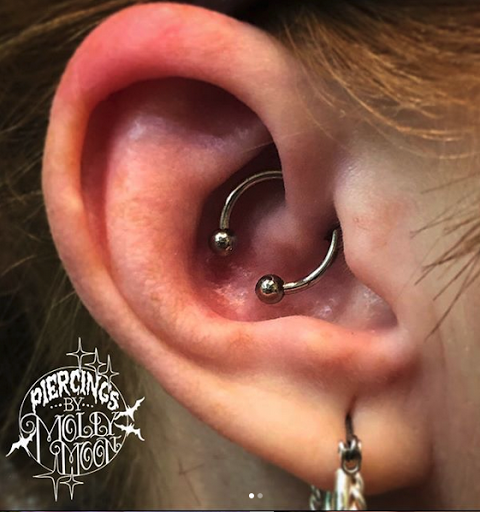 Explore two face tattoo ideas, creative tattoo ideas in Oshkosh, available at Piercings by Molly Moon at 920 Tattoo and Piercing