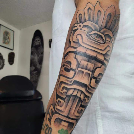 Explore tribal cross tattoo ideas, creative tattoo ideas in Chicago, available at Mind Crusher Tattoo