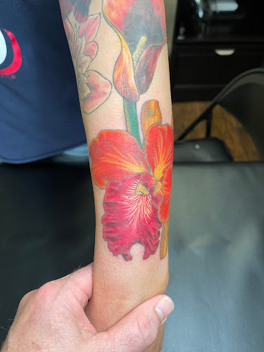 Explore small neck tattoo ideas, creative tattoo ideas in Seaside, available at Creative Visions Ink Tattoo & Body Piercing Studio - Call for Appointment