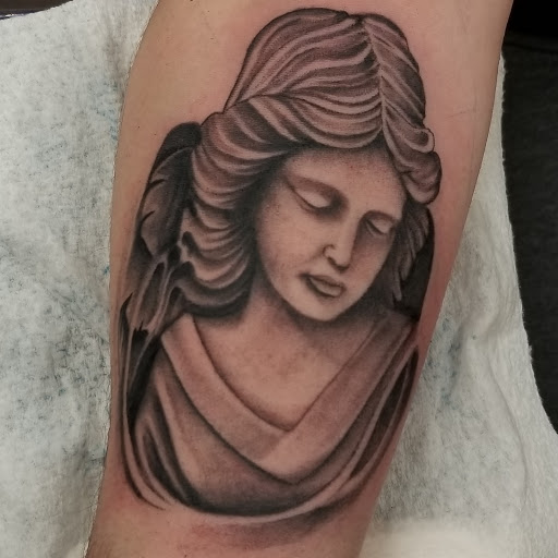 Explore memorial tattoo ideas for son, creative tattoo ideas in Saint Paul Park, available at Lady Liberty Tattoo
