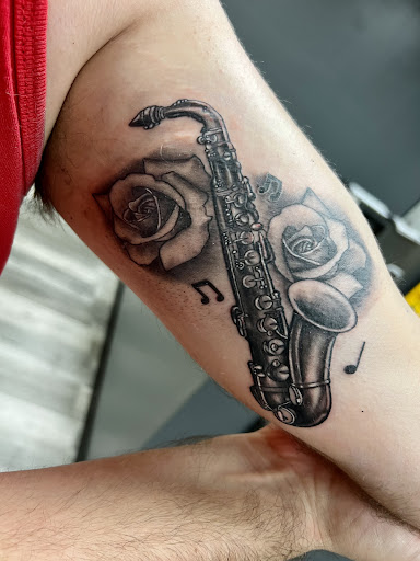 Explore elbow tattoo ideas for men, creative tattoo ideas in Avon Park, available at Lions Den Ink Studio at The Collective