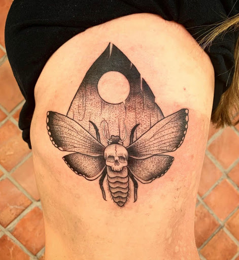 Explore skull neck tattoo ideas, creative tattoo ideas in Stuart, available at Tiger Shark Tattoo Studio