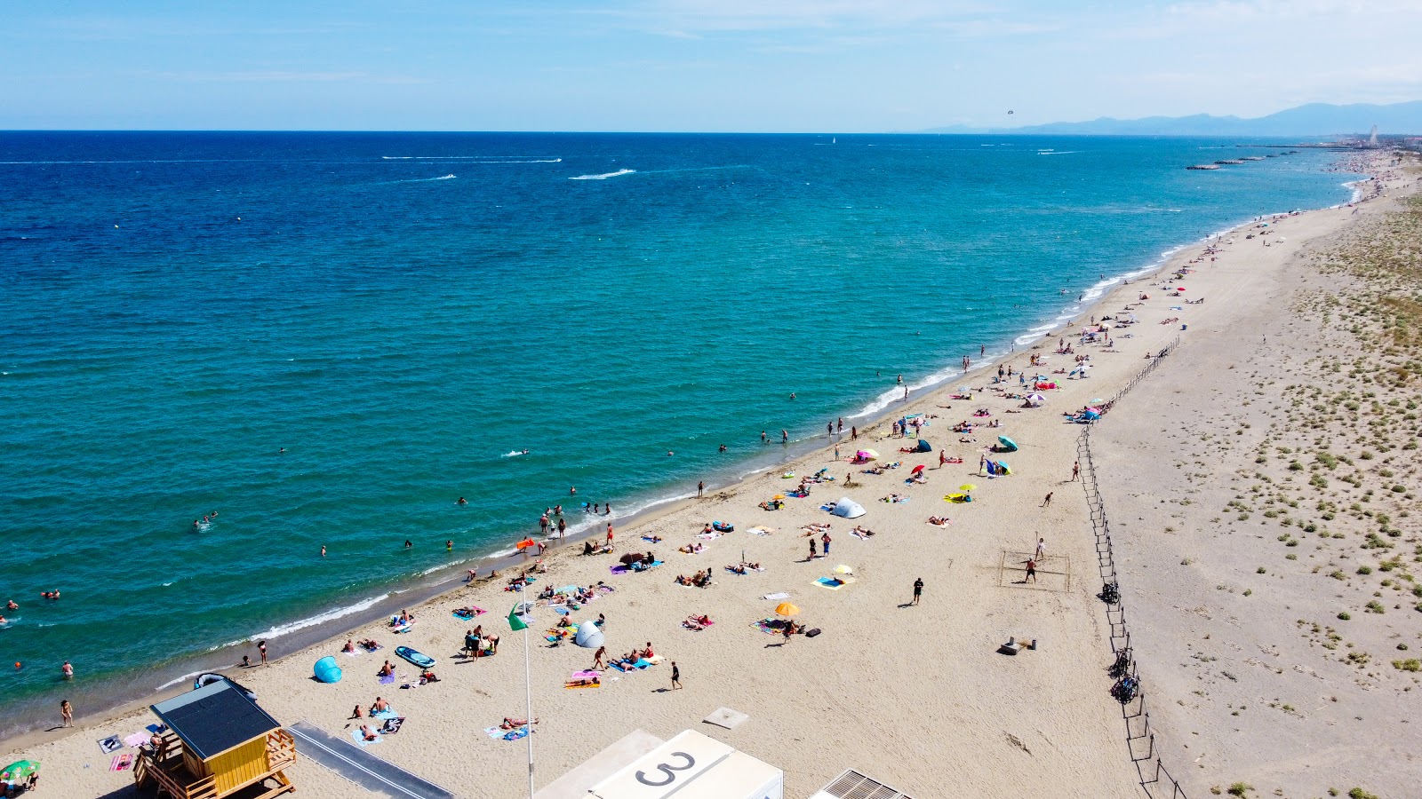 Foto von Plage du Lydia mit beiger sand Oberfläche