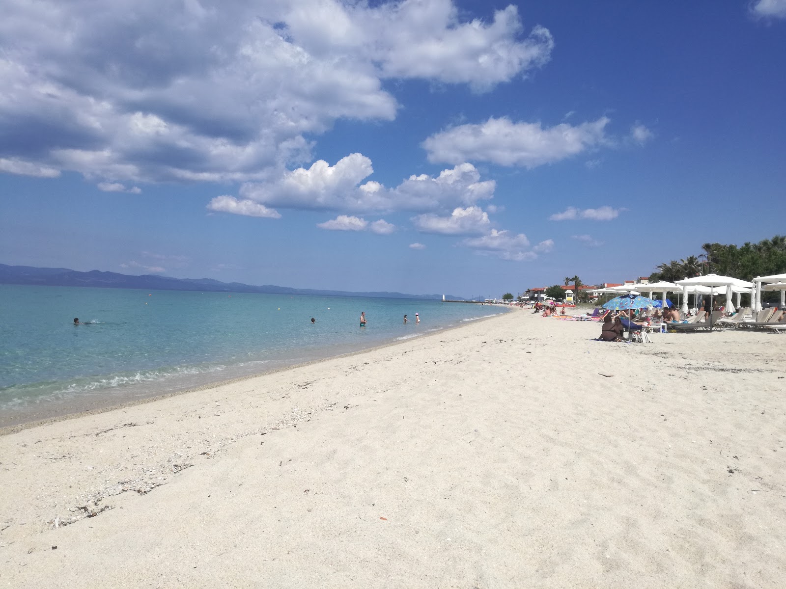 Photo of Pefkochori beach with turquoise pure water surface