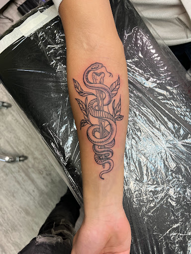 Explore philosophy tattoo ideas, creative tattoo ideas in Alfred, available at Tattooed Spirit