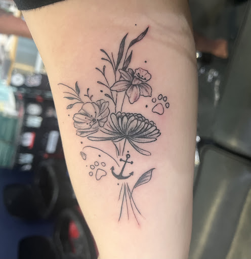 Explore side thigh tattoo ideas, creative tattoo ideas in Destin, available at Atomic Frog Tattoo