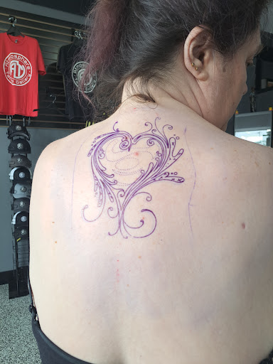 Explore tattoo fill in ideas for men, creative tattoo ideas in Franklin Park, available at Atmosphere Tattoo Gallery - Franklin Park