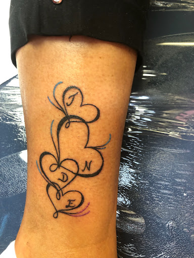 Explore female tattoo ideas for lower back, creative tattoo ideas in Middlefield, available at Connecticut Ink LLC