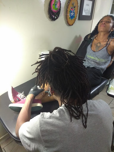 Explore arrow tattoo ideas for men, creative tattoo ideas in Atlanta, available at Iron Palm Tattoos & Body Piercing Atlanta