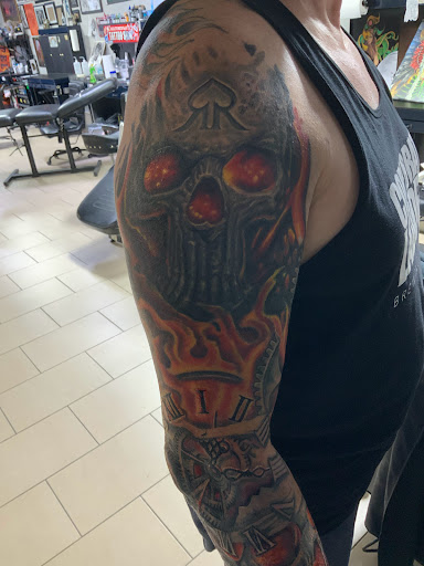 Explore lighter tattoo ideas, creative tattoo ideas in Sarasota, available at SEVEN SINS Tattoo Studio