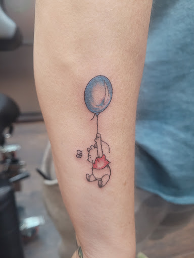 Explore womens neck tattoos ideas, creative tattoo ideas in Jamestown, available at Black Cherry Tattoo Co.