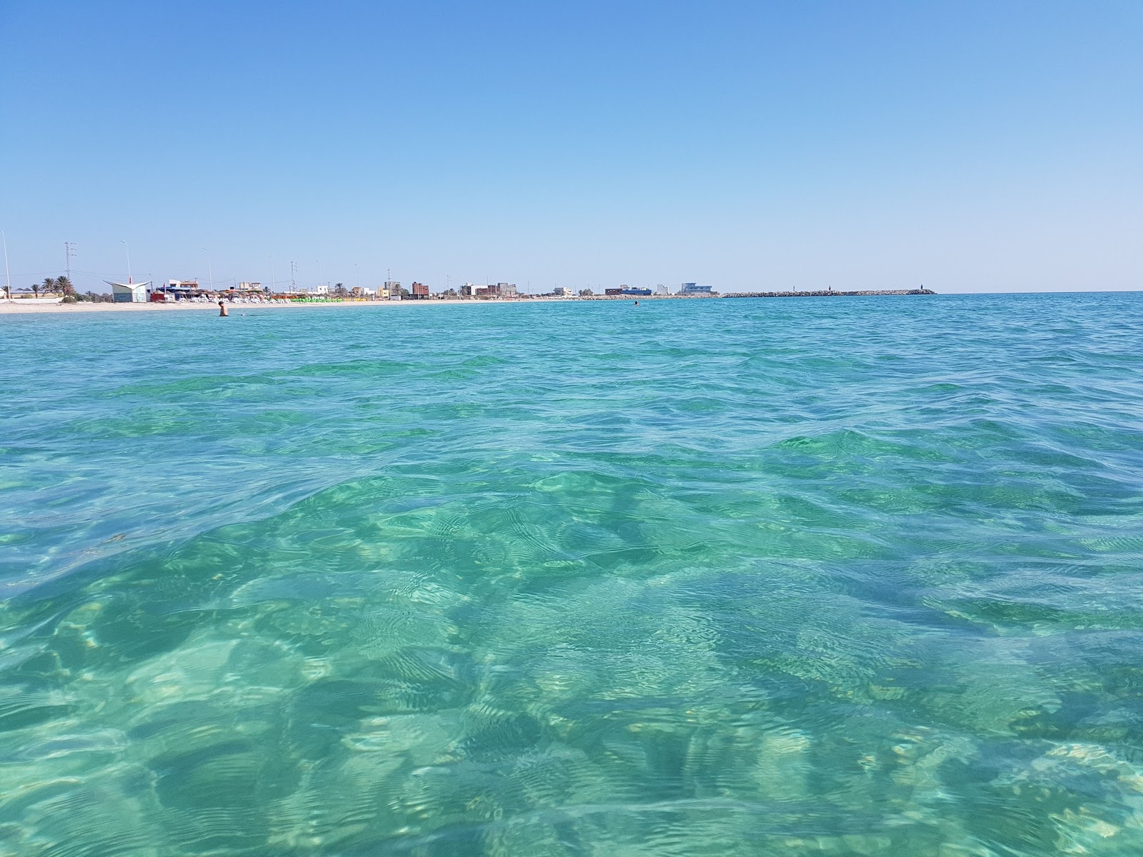 Photo de Dimas beach avec rivage droit, long