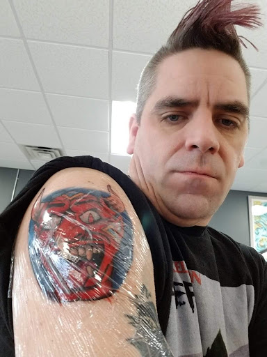 Explore above knee tattoo ideas, creative tattoo ideas in Kenosha, available at Dead Set Ink