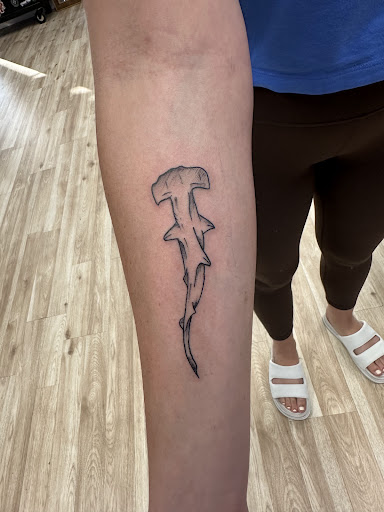 Explore leg tattoo ideas for females, creative tattoo ideas in Arlington, available at Urbans Tattoo & Piercing Studio