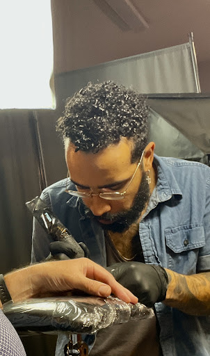 Explore arm tattoo cover up ideas, creative tattoo ideas in Clarksville, available at No Egrets Tattoo Studio