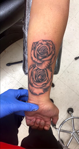 Explore color flower tattoo ideas, creative tattoo ideas in Eden, available at R1sk Takers Ink Tattoo and Piercing Lounge