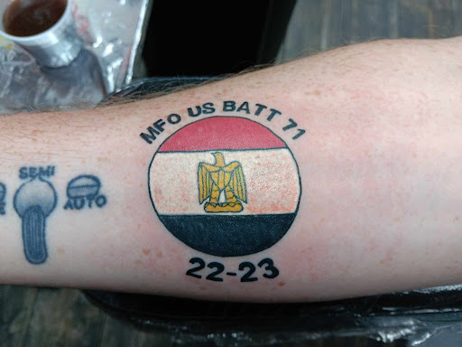 Explore red ink tattoo ideas for guys, creative tattoo ideas in El Paso, available at American Tattoo Society of Ft Bliss