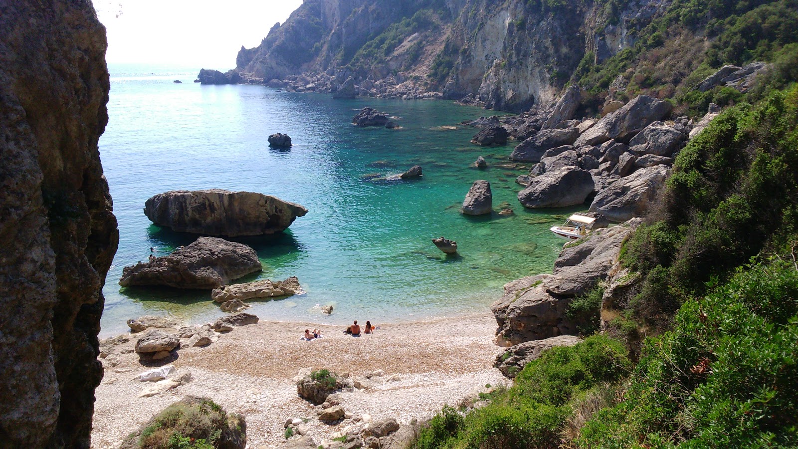 Photo of Ampelaki beach II with gray pebble surface