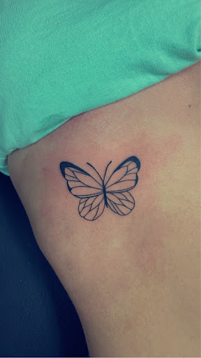 Explore butterfly sleeve tattoo ideas, creative tattoo ideas in Foley, available at Symbolic Ink Tattoo Studio