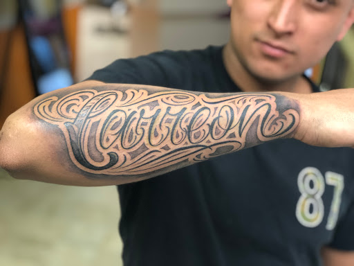 Explore tattoo ideas for names on wrist, creative tattoo ideas in Providence, available at Body Canvas PVD Custom TATTOO Shop