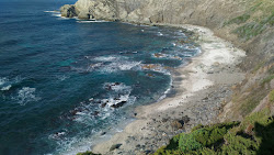 Cala di Punta Agliastroni'in fotoğrafı geniş ile birlikte