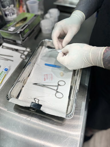 Explore sunflower and roses tattoo ideas, creative tattoo ideas in Des Moines, available at Expo Piercing Ink