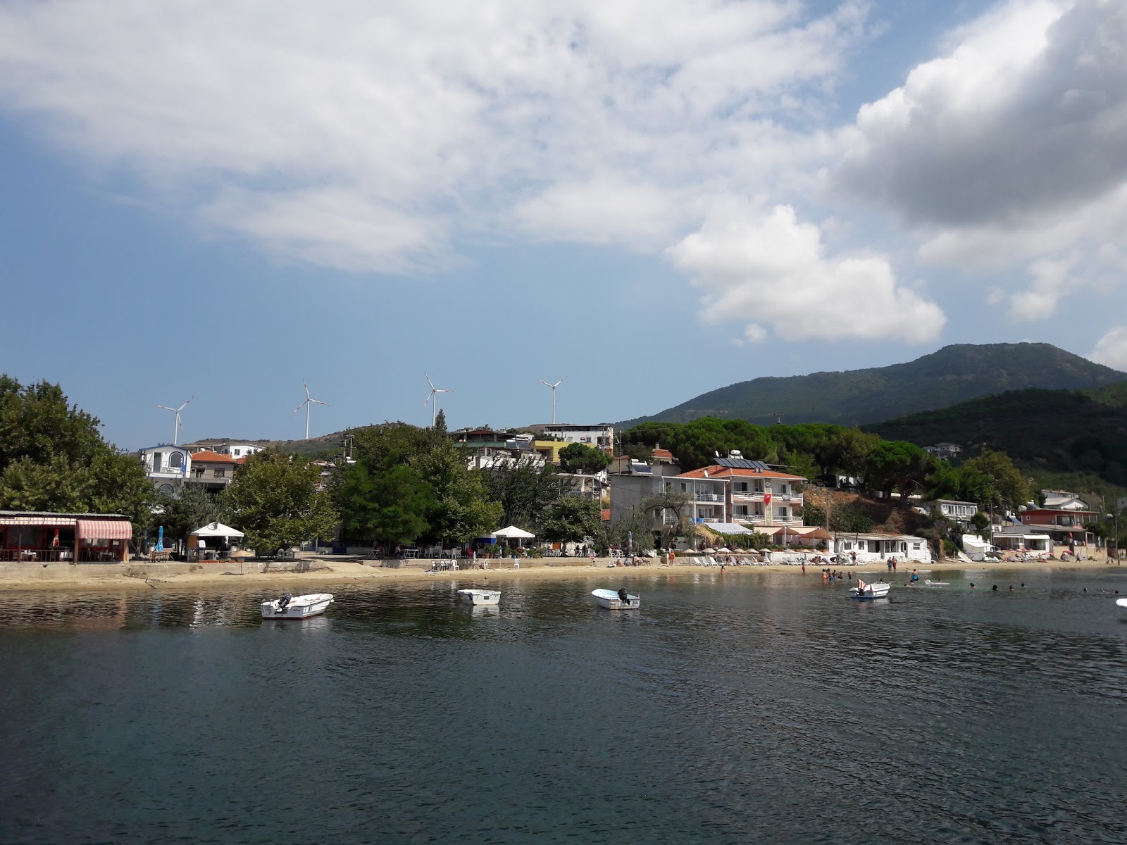 Foto di Narli beach con costa lunga e dritta