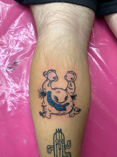 Explore cherub angel tattoo ideas, creative tattoo ideas in Lake City, available at Crooked Spines Tattoo Studio