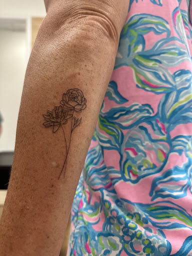 Explore mother daughter flower tattoo ideas, creative tattoo ideas in Sarasota, available at Diamond Reigns Tattoos