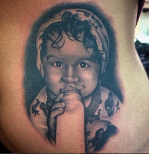 Explore butterfly back tattoo ideas, creative tattoo ideas in Decatur, available at Oakwood Tattoo