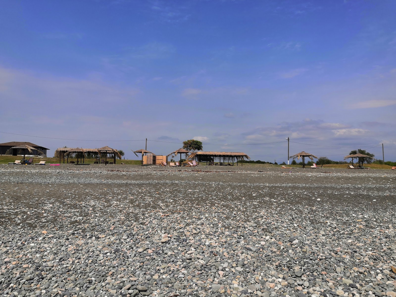 Fotografie cu Skurcha beach cu drept și lung