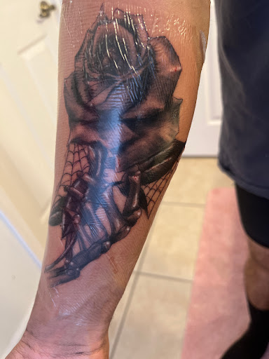 Explore wall-e tattoo ideas, creative tattoo ideas in Kissimmee, available at Fallen Heroes Tattoo & Piercing (Florida)