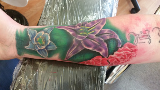 Find tattoo ideas with trees for your next unique tattoo in Cedar City at Macks Tattoo Shop