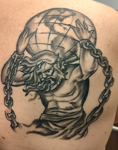 Explore chest cross tattoo ideas, creative tattoo ideas in Saraland, available at Exit 13 Tattoo