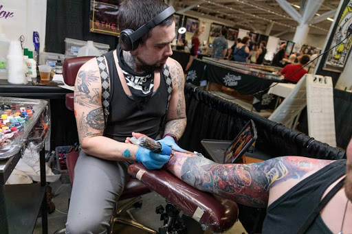 Explore dachshund tattoo ideas, creative tattoo ideas in Canton, available at The Inkeepers Tattoo Parlor