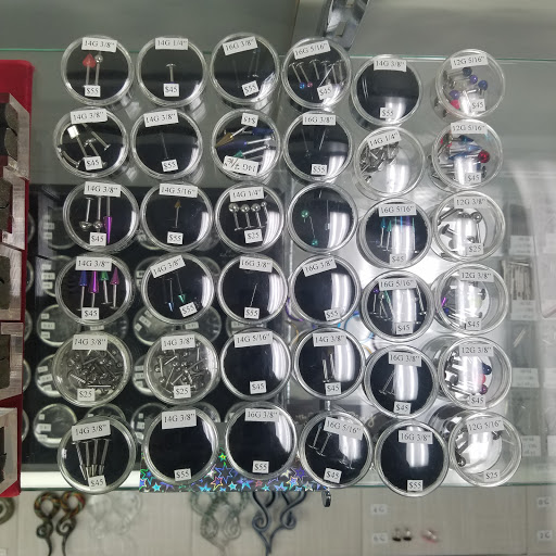 Explore side of finger tattoo ideas, creative tattoo ideas in Huntington Beach, available at Tommy Ts Body Piercing