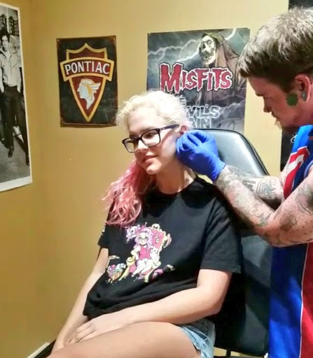 Explore anunnaki tattoo ideas, creative tattoo ideas in Greer, available at Some Prix Piercing