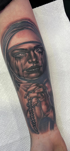 Explore mens hand tattoo ideas, creative tattoo ideas in Denver, available at The Elegant Elephant Tattoo