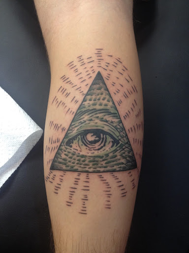 Explore hibiscus flower tattoo ideas, creative tattoo ideas in Erie, available at Wayward Tattoo Studio