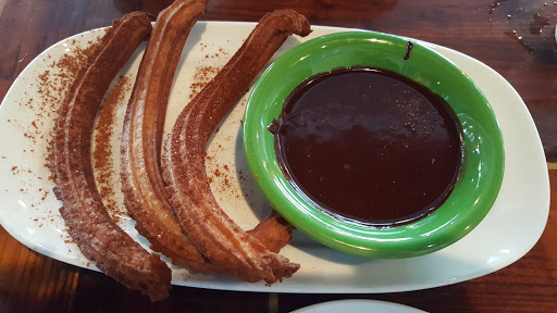 Churros with chocolate in Saint Louis