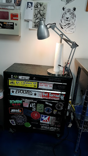 Tattoo Shop «Liquid Tattoo», reviews and photos, 16583 Old U.S. 27, Lansing, MI 48906, USA