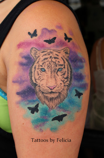 Explore tummy tuck tattoo ideas female, creative tattoo ideas in Fort Myers, available at Tiger Lotus Tattoo and Piercing