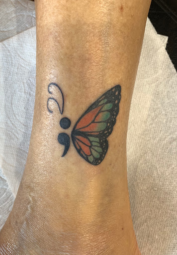 Explore pectoral tattoo ideas, creative tattoo ideas in Kansas City, available at Golden Stag Tattoo and Gallery