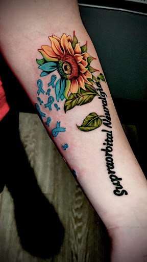 Explore tattoos ideas for men cross, creative tattoo ideas in Ottawa, available at Audacious Ink Tattoo Studio