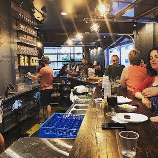 A pint of beer on a bar