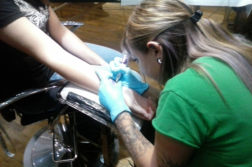 Explore cat paw tattoo ideas, creative tattoo ideas in Baldwinsville, available at Tymeless Tattoo