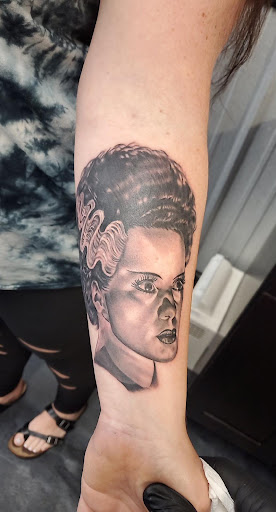 Explore mens back tattoo idea, creative tattoo ideas in Augusta, available at Moth & Magpie Tattoo