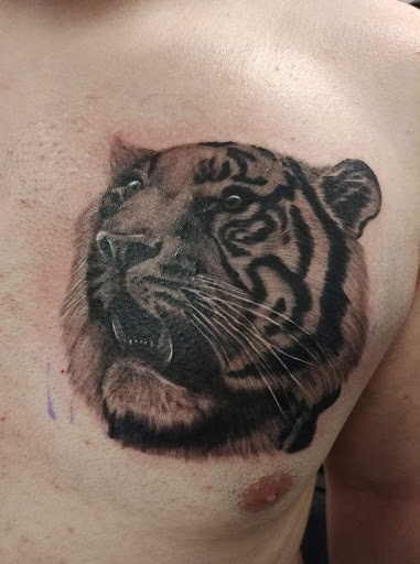 Explore october tattoo ideas for guys, creative tattoo ideas in West Jefferson, available at Black Dagger Tattoo Collective